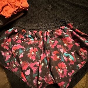 Lulu athletic shorts. Floral print. Mesh on sides. Size 4